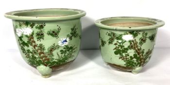 A pair of modern Chinese celadon graduated decorative planters, 20th century, painted with flowers