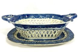 An English pearlware blue and white chestnut basket and matching stand, 19th century, reticulated