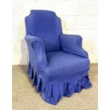 A Victorian small armchair, with arch topped back, with blue loose cover and replaced ball castors