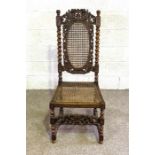 A Carolean style caned oak side chair, late 19th century, with twist column supports and carved