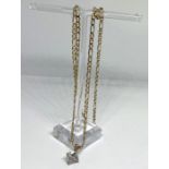 A 9 carat gold necklace, with a square white stone pendant, probably CZ, 52cm long, marked 375,