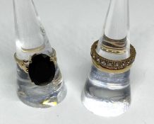 A 9 carat gold full hoop eternity ring, white stones (not testing as diamond), ring size O, 2.5g (