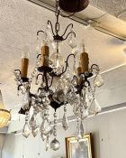 A vintage glass chandelier, with five lights and multiple pendant glass drops