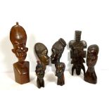 A small group of African tribal head carvings, 20th/21st century, various sizes (8)