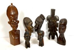A small group of African tribal head carvings, 20th/21st century, various sizes (8)