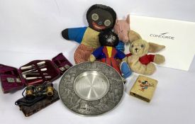 A group of miscellaneous items, including hand bags, two Golly dolls, and a small selection of loose