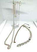 Assorted jewellery, including a fine 9 carat gold chain, 1.3g; a yellow metal chain, 2g; a silver