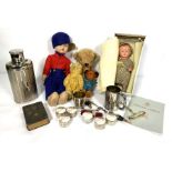 A group of miscellaneous items, including a large vintage teddy bear, assorted dolls, a cased set of