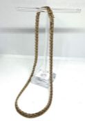 A 9 carat gold curb chain necklace, with a flat decorative interlocking chain, marked on locking