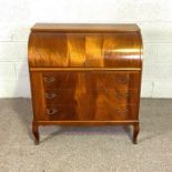 A Victorian style roll top bureau with three long drawers, 98cm high. 90cm wide; together with a