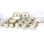 A large assortment of of ceramic tea services, including a Royal Crown Derby twelve place part