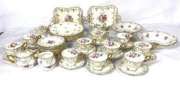 A large assortment of of ceramic tea services, including a Royal Crown Derby twelve place part