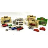 A collection of vintage toy cars, some boxed, together with assorted items, including a Britannia