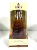 A Bell’s Millenium 2000 Extra Special Whisky Decanter, 70cl. 40% vol, with original box