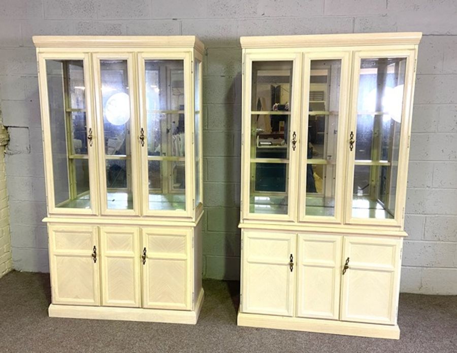 A pair of modern ‘limed’ wood china display cabinets, circa 2000, with mirrored backs and glass