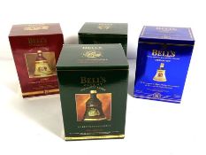 Five Bell’s Whisky Decanters, including two Christmas 1993, Christmas 1992, Christmas 1996 and Queen