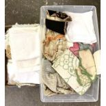 Two large boxes of assorted linens and related material, including place mats and other table