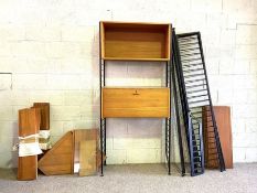 A highly adaptable vintage Ladderax shelving system, mid 20th century, with shelves, cabinets,