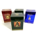 Five Bell’s Whisky Decanters, including two Christmas 1993, Christmas 1992, Christmas 1996 and Queen