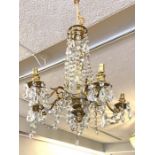 A pair of vintage gilt metal five arm Chandeliers, French style, mid/ late 20th-century, with