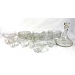 A good and varied selection of cut and moulded glassware, including a Ships decanter, fruit bowls,