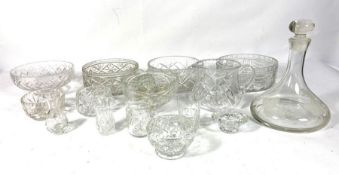A good and varied selection of cut and moulded glassware, including a Ships decanter, fruit bowls,