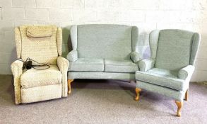 A modern upholstered Parker Knoll style two seat settee and matching chair; together with an