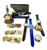 A small group of assorted modern watches, including a boxed Stauer watch; A Daniel Hechter