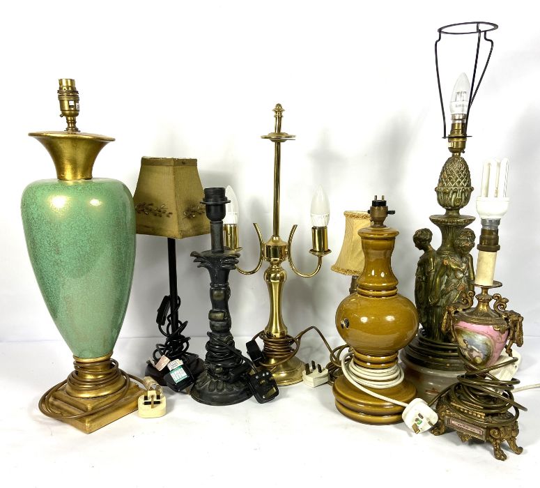 A group of assorted decorative table lamps, including a French style gilt metal urn lamp base and an