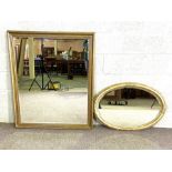 A large gilt moulded rectangular wall mirror, with beaded mouldings; together with an oval