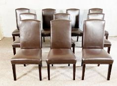 A set of ten modern brown leathered dining chairs chairs, with high arched backs and nailed