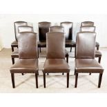 A set of ten modern brown leathered dining chairs chairs, with high arched backs and nailed