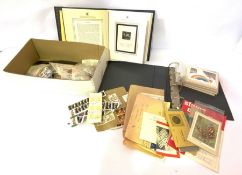 A large assortment of stamps and related ephemera, including some albums, loose stamps, collectors