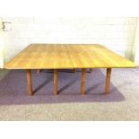 A large two section work or dining table, modern, on plain square section legs (might make a handy