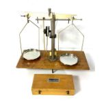 A vintage George & Bekker Balance Scale, in a glazed case, 46cm wide; together with a Griffin &