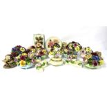 A large assortment for decorative flower posies and, vases and related, all decorated in colours and