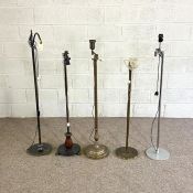 Five assorted modern standard lamps, including three brass effect column lamps, together with