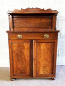 A Regency mahogany chiffonier, circa 1820, with fretwork moulded gallery top, over a single drawer