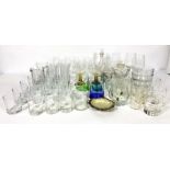 Assortment of glassware, including coloured glass, a butter shell, assorted jugs, tumblers,