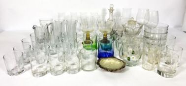 Assortment of glassware, including coloured glass, a butter shell, assorted jugs, tumblers,