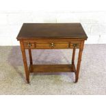 An Edwardian swivel topped folding card table, with three frieze drawers, 76cm high, 78cm wide