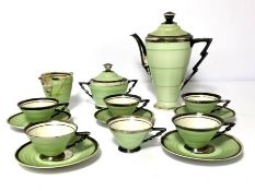 An Art Deco porcelain tea service, mid 20th century, of tapered form with a lime green ground and