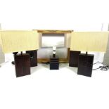 A set of four leather based table lamps and shades, also a similar leather framed wall mirror, 118cm