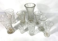 Twelve assorted cut and moulded glass celery and trumpet vases