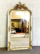 A George II style composition gilt wall mirror, late 20th century, with ornate cresting and bevelled