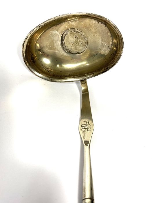 A Regency silver and baleen toddy ladle, the bowl inset with a silver 1811 token, with a twist - Image 3 of 5