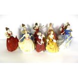 A group of nine assorted Royal Doulton bone china figures of ladies, including ‘Helen’ HN3886;