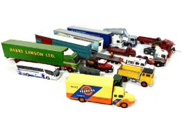 An assortment of scale models, including a selection of British hauliers rigs, one with a hay