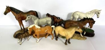 A group of assorted models of horses, including Royal Doulton figure of Dessert Orchid, 24cm high; a