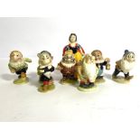 A rare complete set of Beswick pottery figures of Walt Disney’s Snow White & The Seven Dwarfs, circa